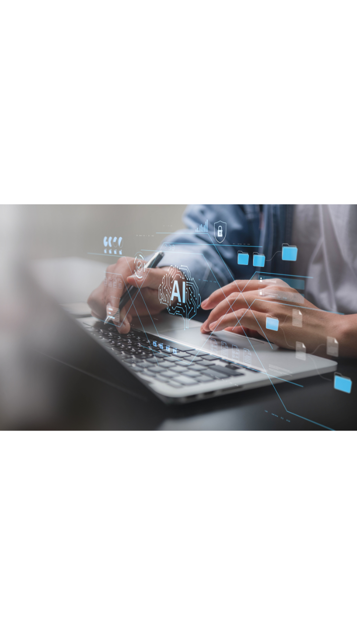 Professional using a laptop with digital AI, data management and security icons, representing responsible AI use and business data protection.