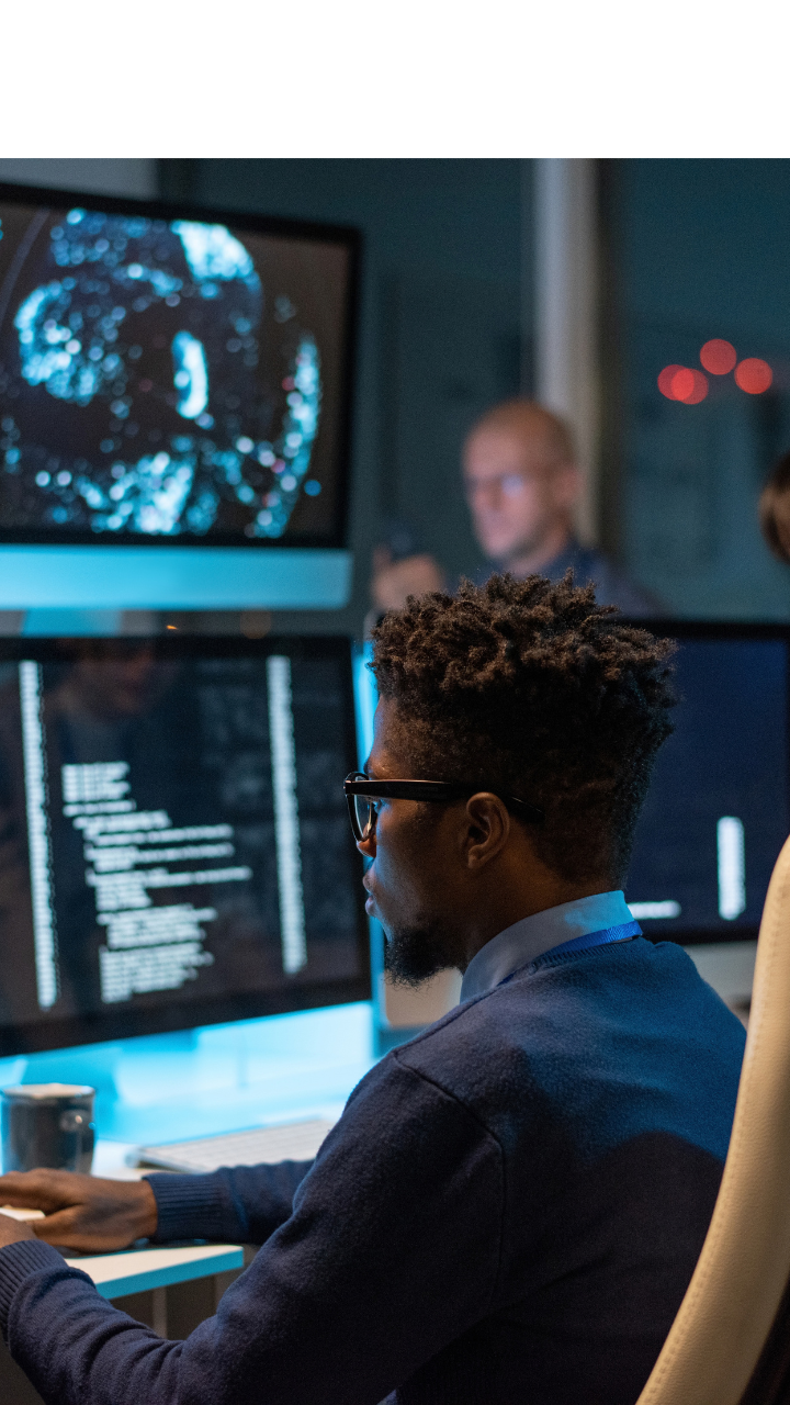 Cybersecurity professional monitoring digital threats and cyber resilience.