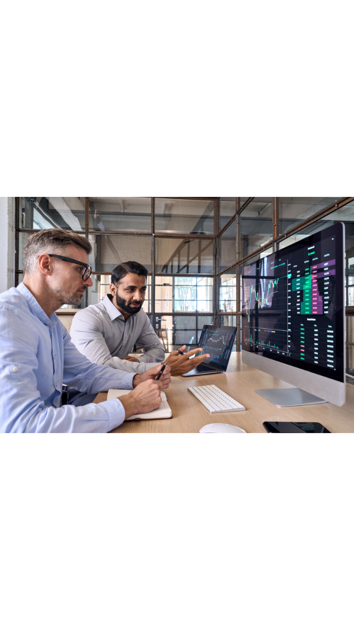 Business professional interacting with a digital interface displaying data analytics and technology insights.